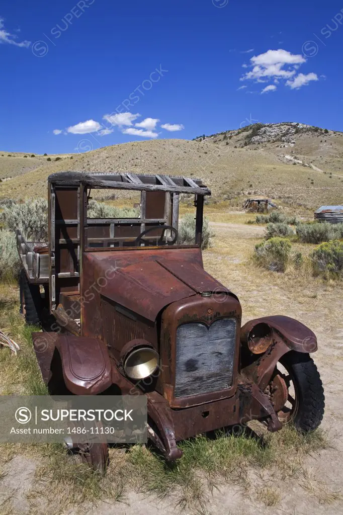 Abandoned truck in a field at a ghost town, Bannack State Park, Dillon, Montana, USA
