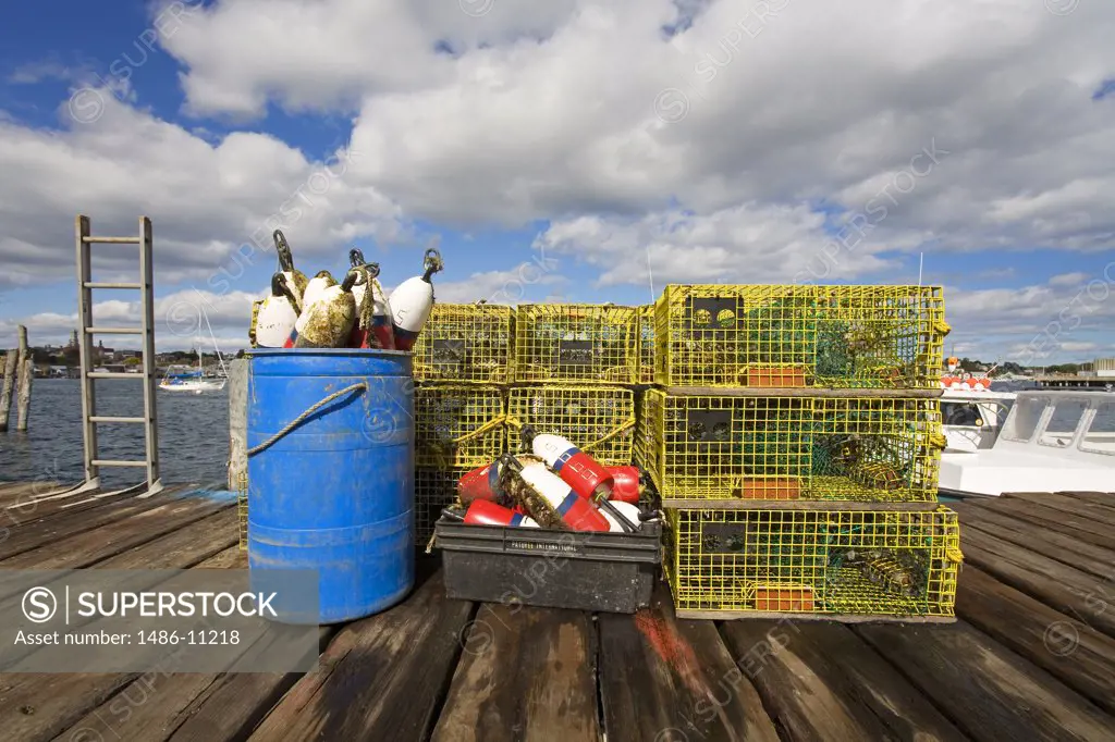 Lobster traps and lobster buoys on a fishing pier, Rocky Neck, Gloucester, Cape Ann, Massachusetts, USA