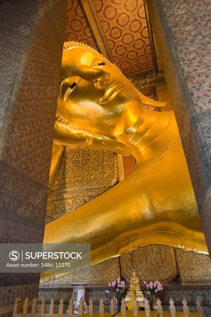Statue of reclining Buddha in a temple, Wat Pho, Rattanakosin District, Bangkok, Thailand