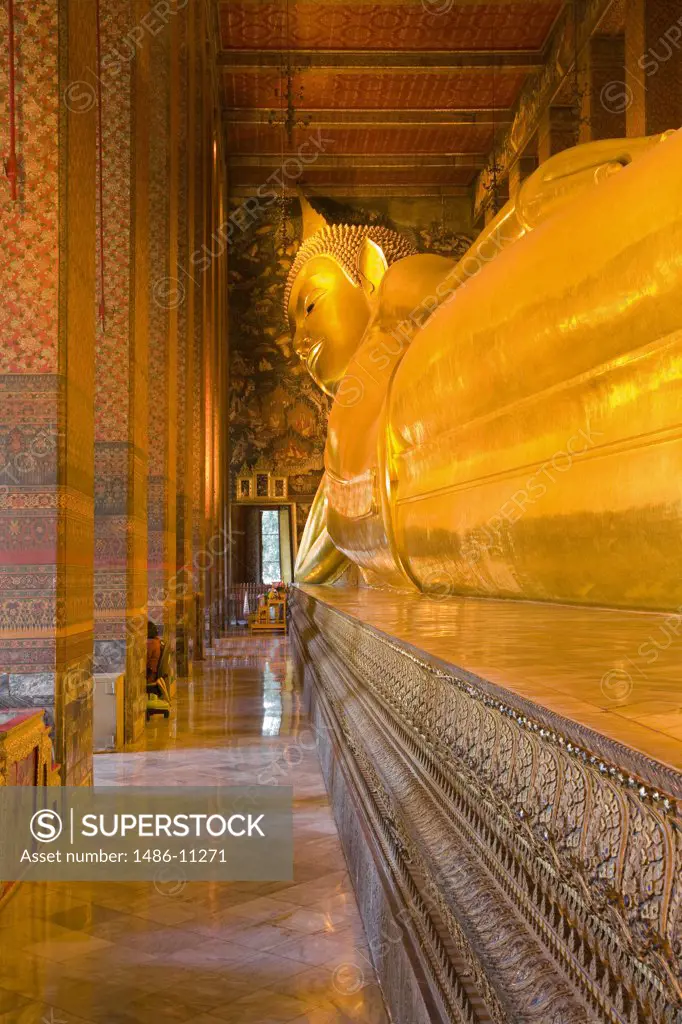 Statue of reclining Buddha in a temple, Wat Pho, Rattanakosin District, Bangkok, Thailand