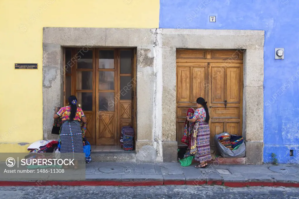 Street vendors in front of a building, Antigua, Guatemala