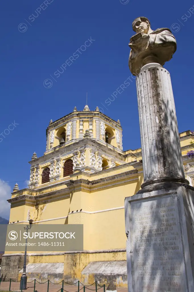 Statue in front of a church, Father Bartolome de Las Casas, Iglesia y Convento de Nuestra Senora de la Merced, Antigua, Guatemala