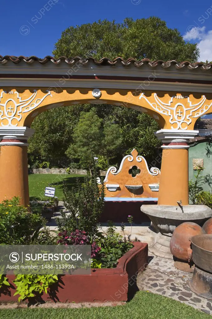 Arch in the garden of a cafe, Cafe Barroco, Antigua, Guatemala