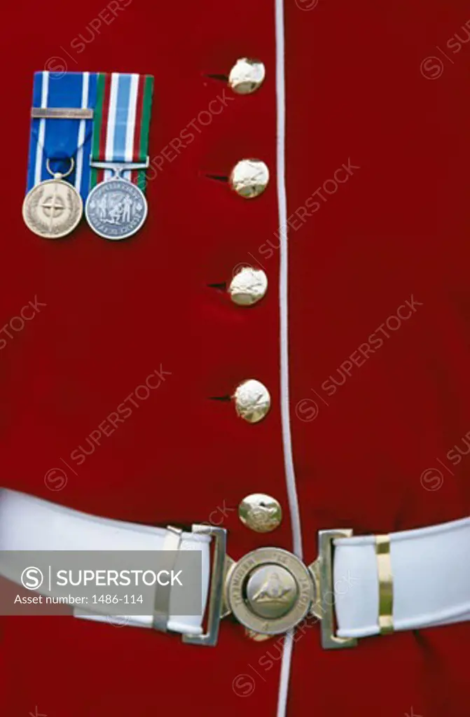 Mid section view of a ceremonial guard with medals, Quebec City, Quebec, Canada