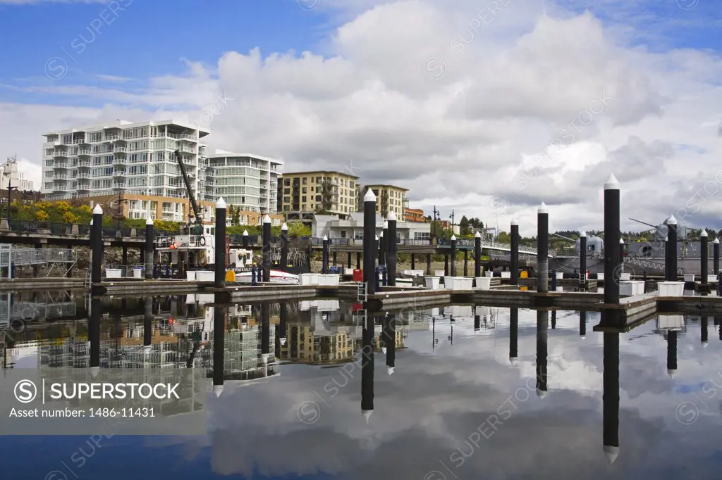 Reflection of buildings in water, Harborside Fountain Park, Bremerton, Kitsap County, Washington State, USA