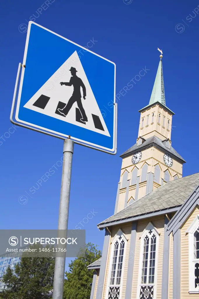 Pedestrian Crossing sign in front of a cathedral, Kirkeparken, Tromso, Toms County, Nord-Norge, Norway
