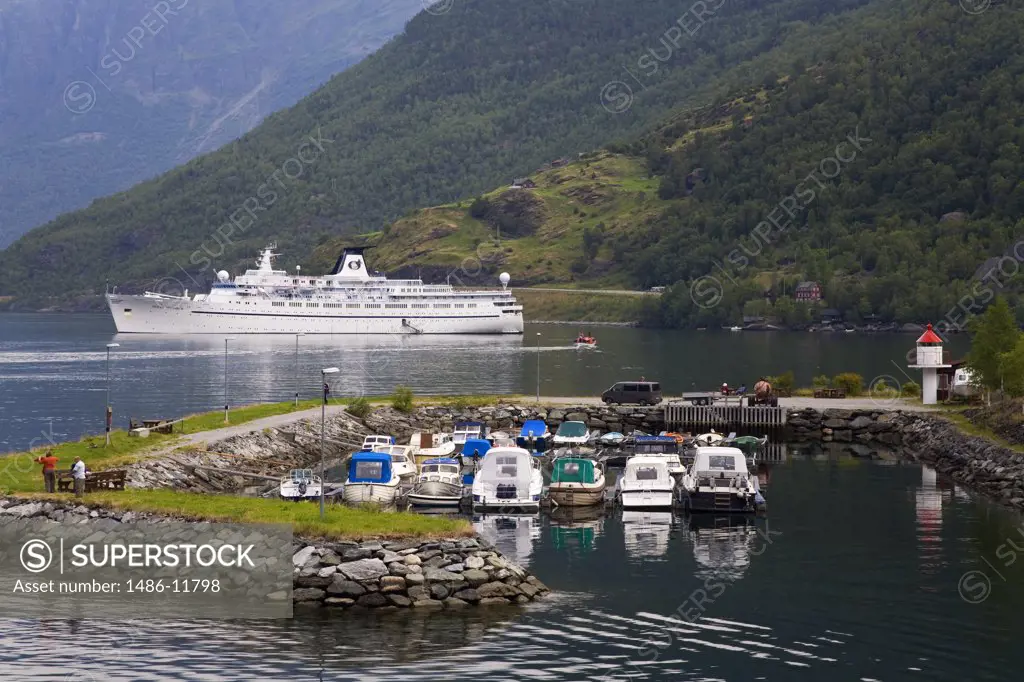 Boats at a harbor with a cruise ship in the background, Flam, Aurlandsfjord, Sogn Og Fjordane, Norway