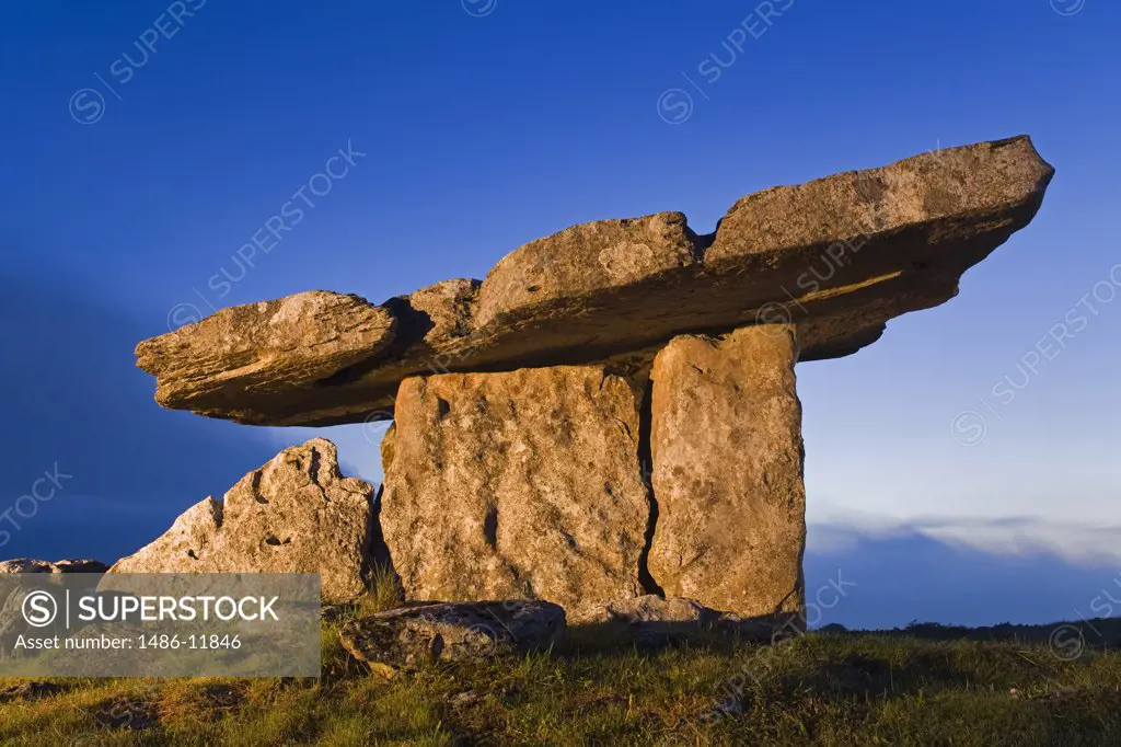 Low angle view of a megalithic stone tomb, Poulnabrone Dolmen, The Burren, County Clare, Munster Province, Republic of Ireland