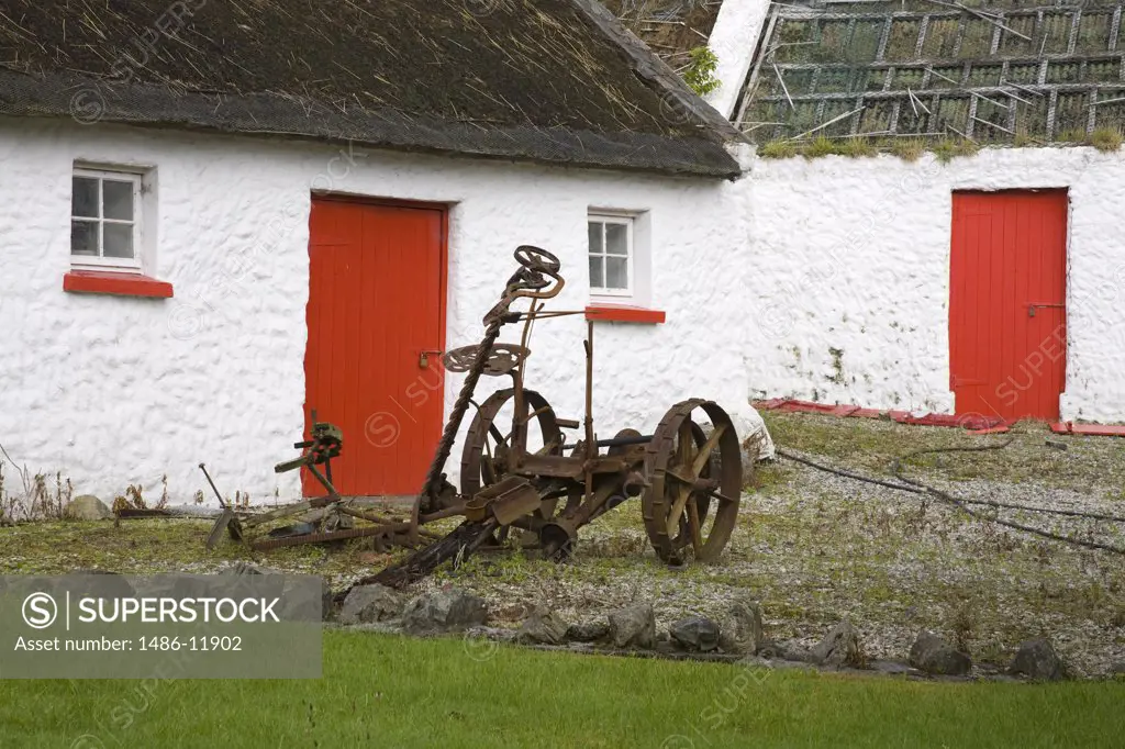 Abandoned cart in front of a cottage, Kilmacrenan, County Donegal, Ulster Province, Ireland