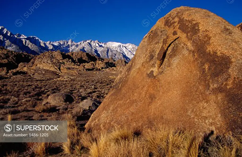 Boulders with mountains in the background, Alabama Hills Recreation Area, California, USA