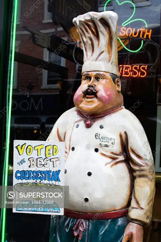 Statue of a chef with signboard outside of a restaurant, South Street, Philadelphia, Pennsylvania, USA