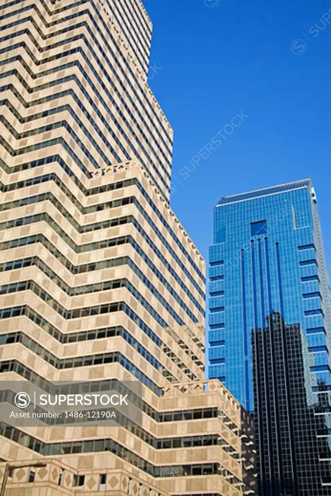 Low angle view of commercial buildings, Commerce Tower, G. Fred DiBona Jr. Building, Commerce Square, Center City, Philadelphia, Pennsylvania, USA