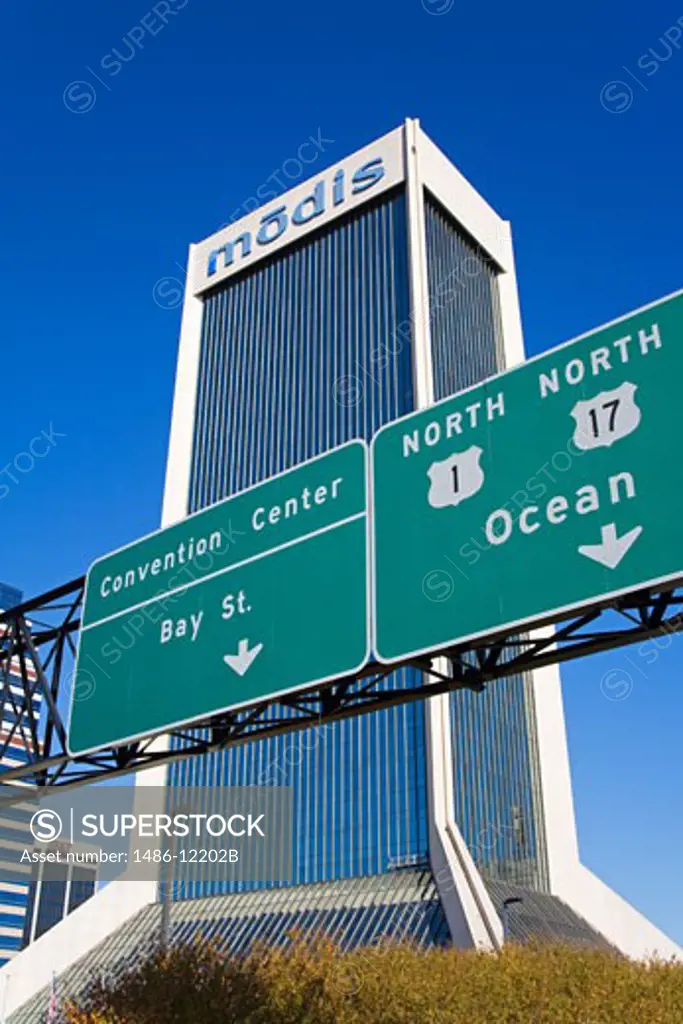 Low angle view of a road sign, Modis Tower, St. John's River, Jacksonville, Duval County, Florida, USA