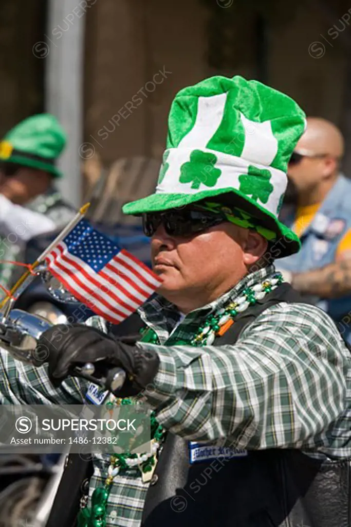 Biker in St. Patrick's Day Parade, Los Angeles, California, USA