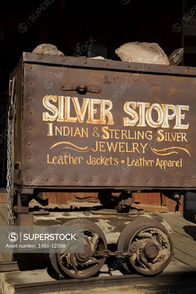 Silver Stope Jewelry Store sign painted on an abandoned ore wagon, Virginia City, Nevada, USA