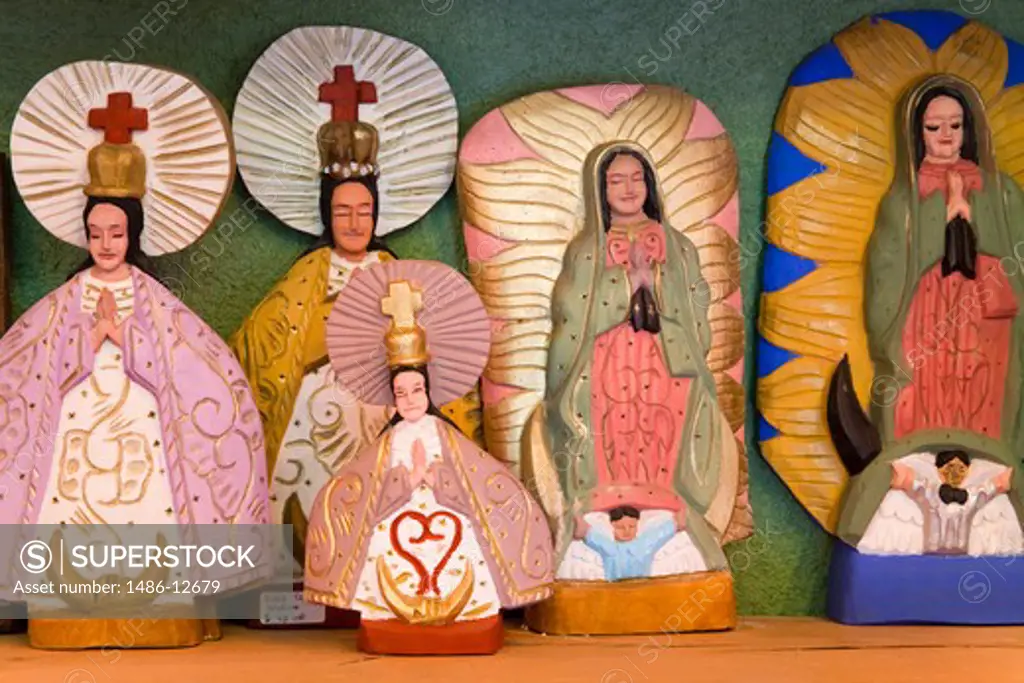 Close-up of religious figurines, Mi Casa restaurant And Craft Store, Cabo San Lucas, Baja California, Mexico