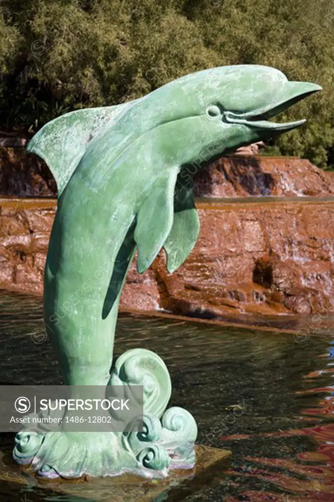 Statue of Dolphin in a pond, The Mirage, The Strip, Las Vegas, Nevada, USA