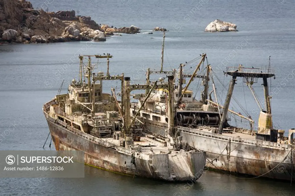 Abandoned fishing boats in the sea, Coquimbo Port, Coquimbo, Norte Chico, Chile