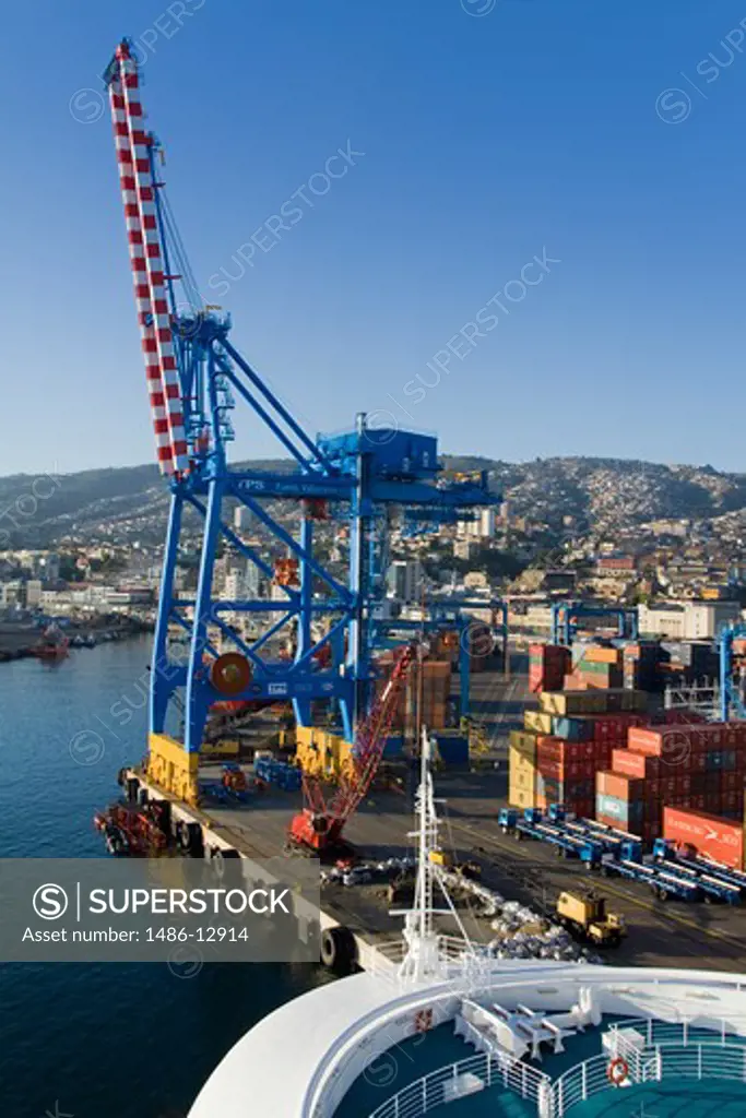 Crane and cargo containers at a commercial dock, Valparaiso, Chile