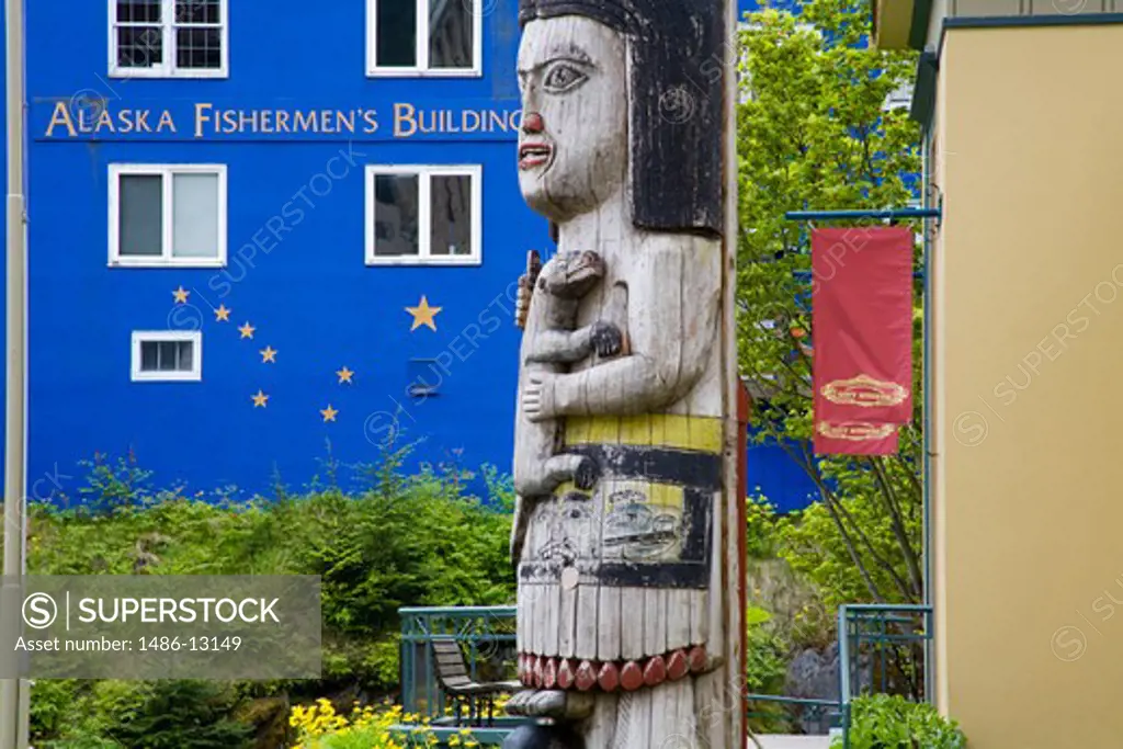 Totem pole in front of museums, Alaska Fishermen's Building, Juneau-Douglas City Museum, Juneau, Alaska, USA