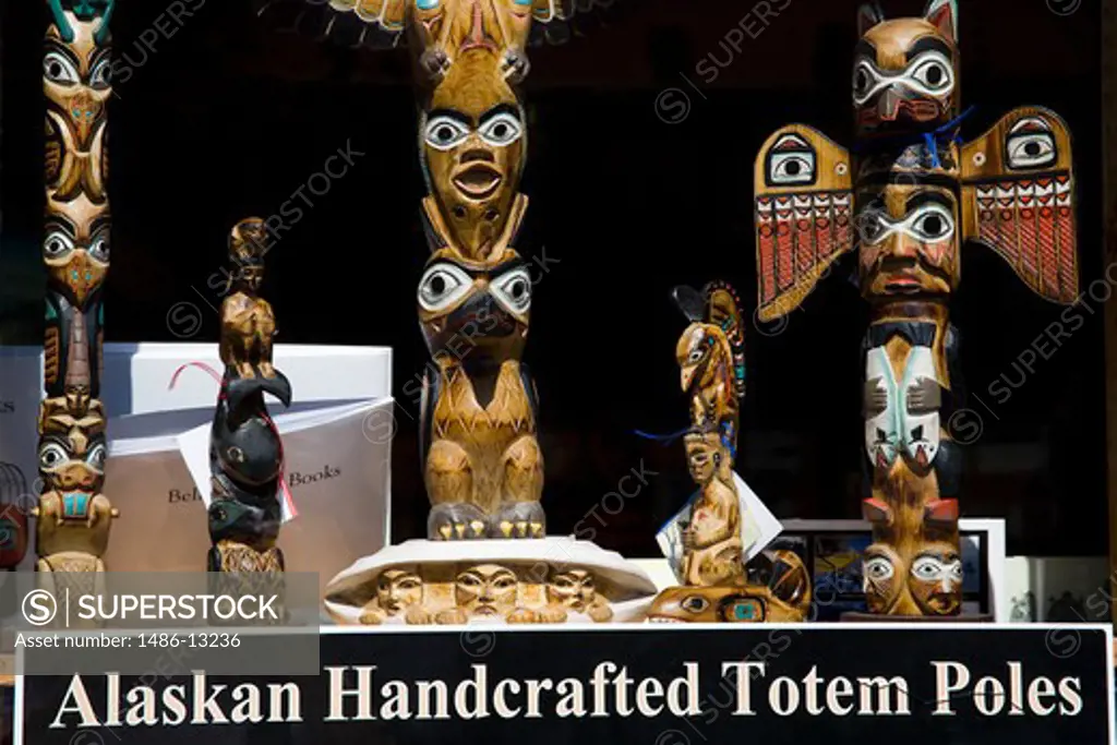 Totem poles at a store, Creek Street, Ketchikan, Alaska, USA
