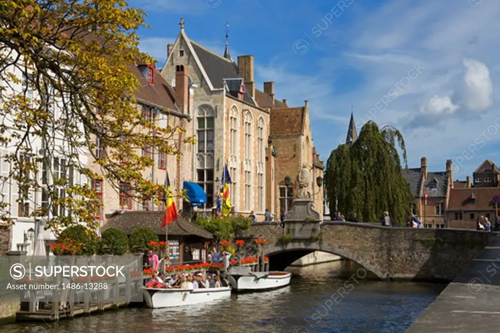Tourboats in a canal, Bruges, Belgium