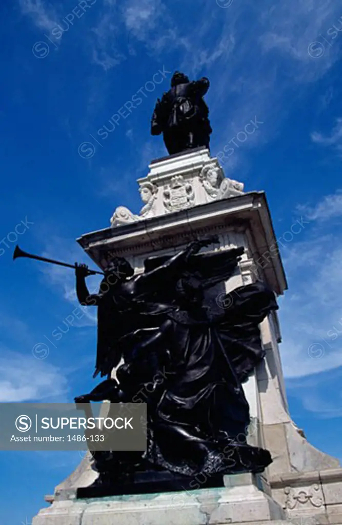 Low angle view of Statue Of Samuel De Champlain at a monument, Quebec City, Quebec, Canada