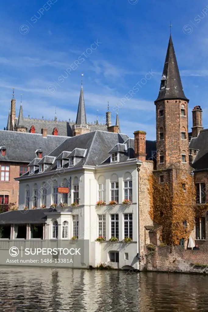 Buildings along a canal, Huidenvetters Square, Bruges, Belgium