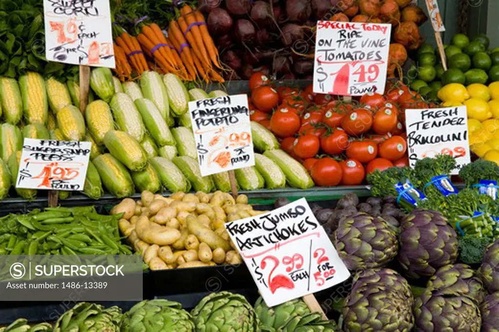 USA, Washington, Seattle, Vegetables on market stall at Pike Place Public Market
