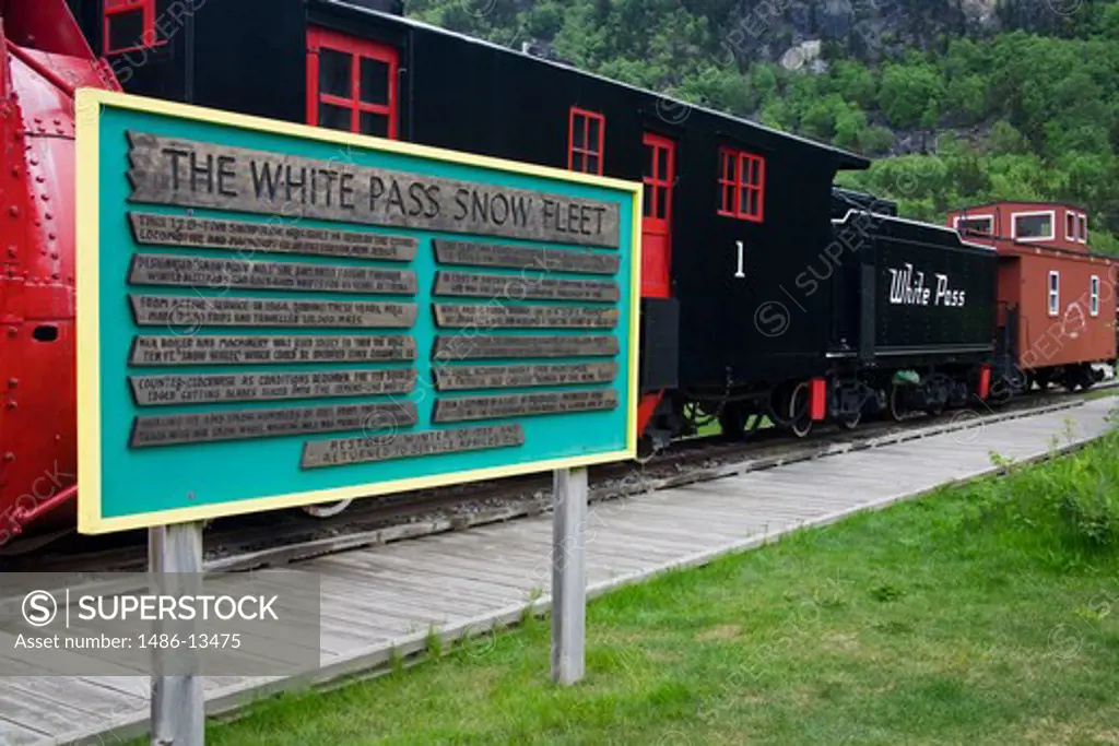 Signboard in front of a snowplow, White Pass and Yukon Route, Skagway, Alaska, USA