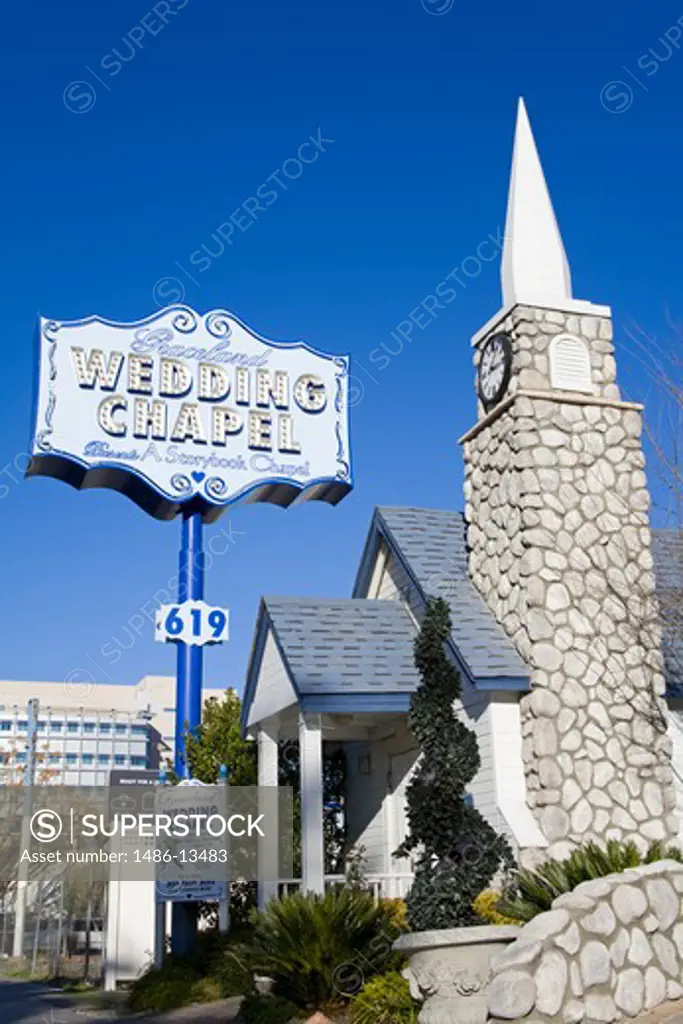 Neon sign in front of a wedding chapel, Graceland Wedding Chapel, Las Vegas, Nevada, USA