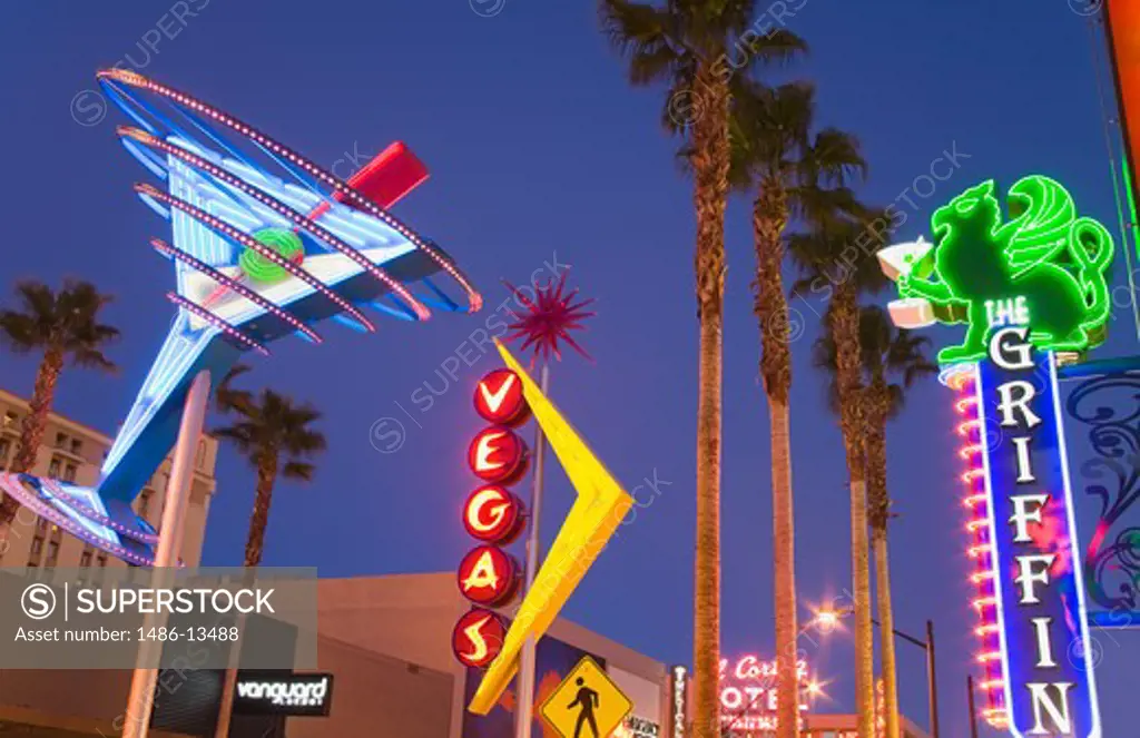 Neon signs lit up at night in a city, Fremont Street East District, Las Vegas, Nevada, USA