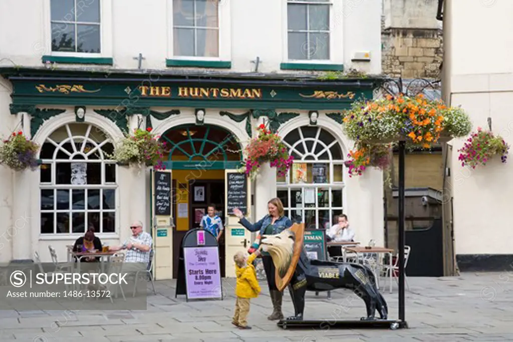 Tourists at a sidewalk cafe, The Huntsman Pub, North Parade, Bath, Somerset, England