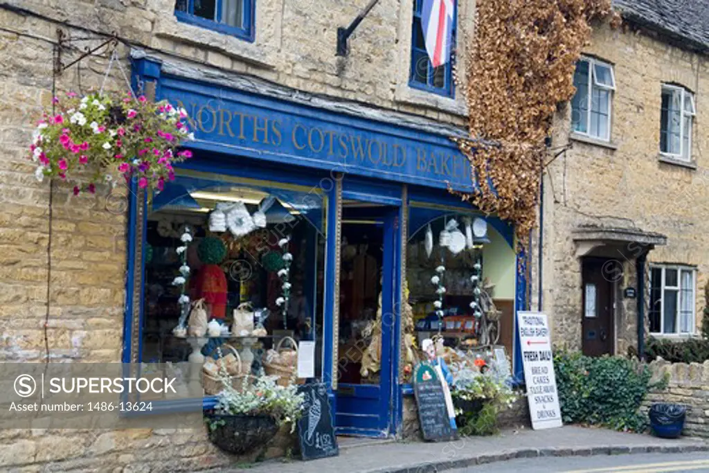 Window display of a bakery, Bourton-on-the-Water, Gloucestershire, England
