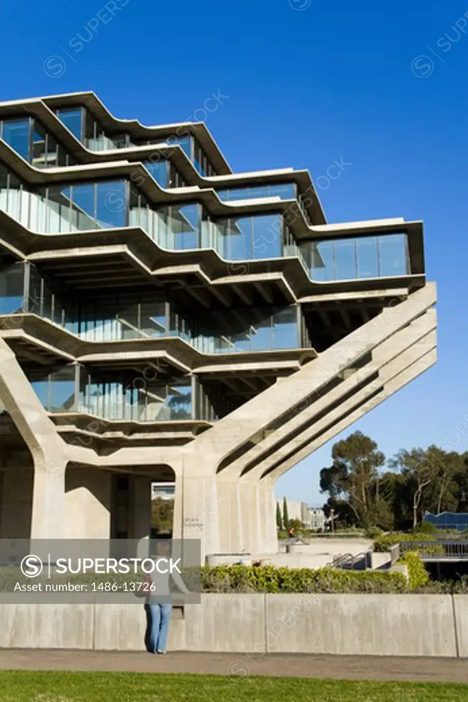 Rear view of a woman looking at a library, Geisel Library, University Of San Diego, La Jolla, San Diego, California, USA