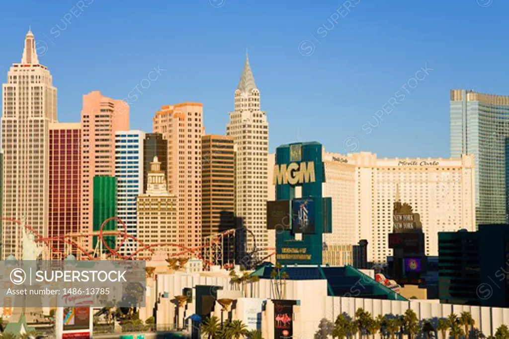 Hotels and skyline in a city, Monte Carlo Resort And Casino, New York New York Hotel, The Strip, Las Vegas, Nevada, USA