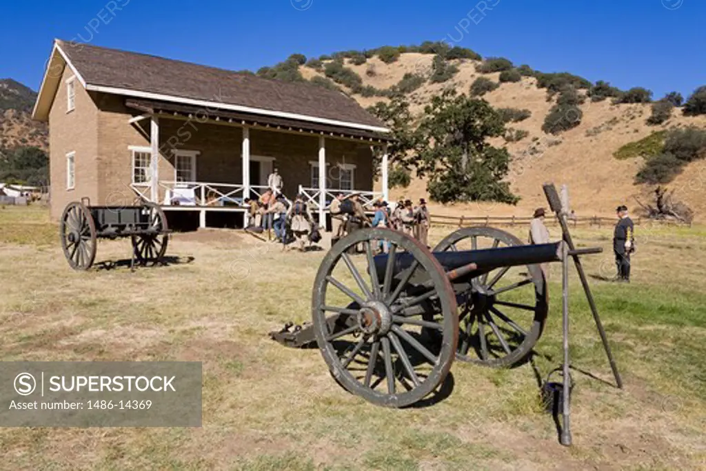 USA, California, Kern County, Lebec, Fort Tejon State Historic Park, view of building and cannons