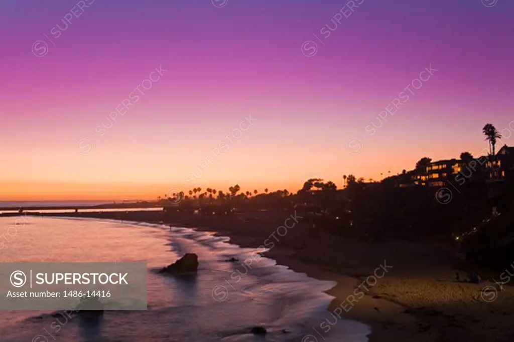 USA, California, Orange County, City of Newport Beach, Corona del Mar Beach at twilight