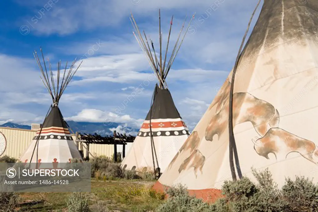 Teepees on a hill, Taos, New Mexico, USA