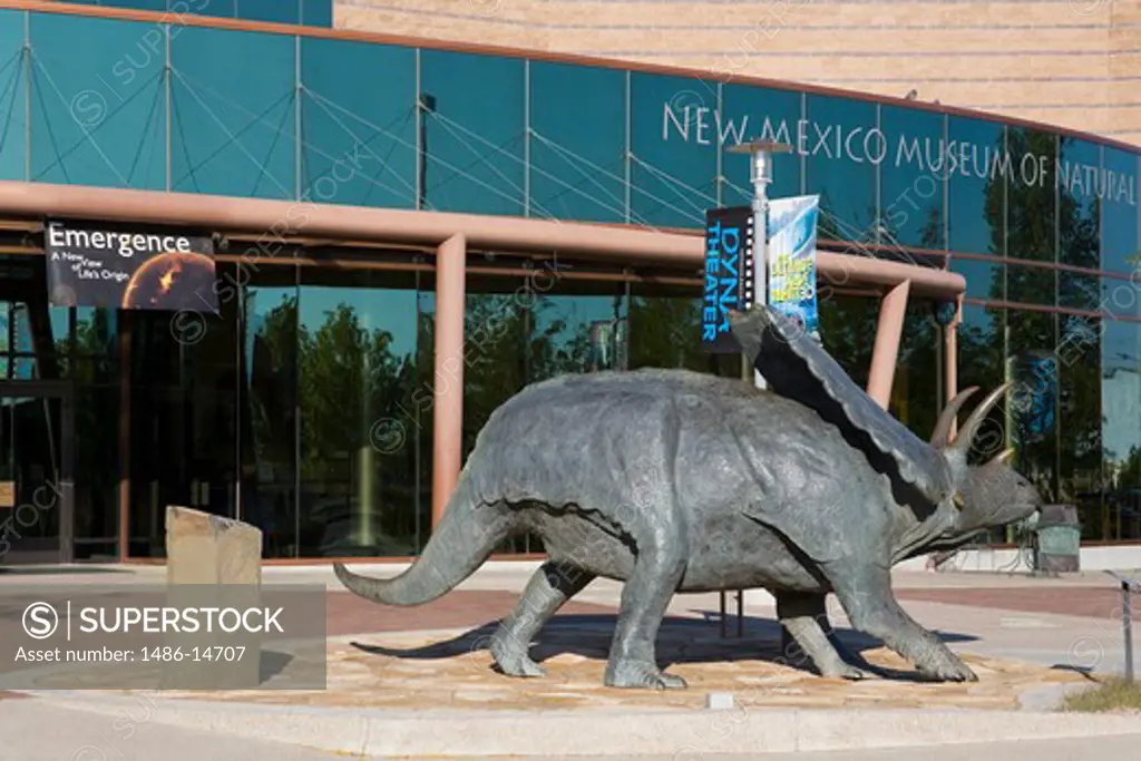 USA, New Mexico, Albuquerque, New Mexico Museum of Natural History, Pentaceratops sculpture in front of building