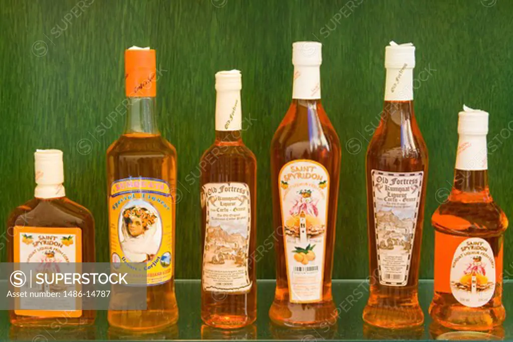 Kumquat liqueur bottles in a store, Corfu Town, Ionian Islands, Greece