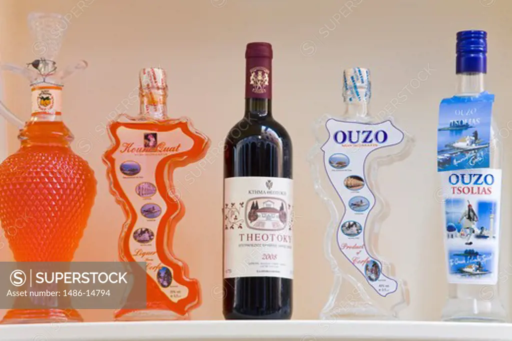Ouzo liqueur bottles in a store, Corfu Town, Ionian Islands, Greece