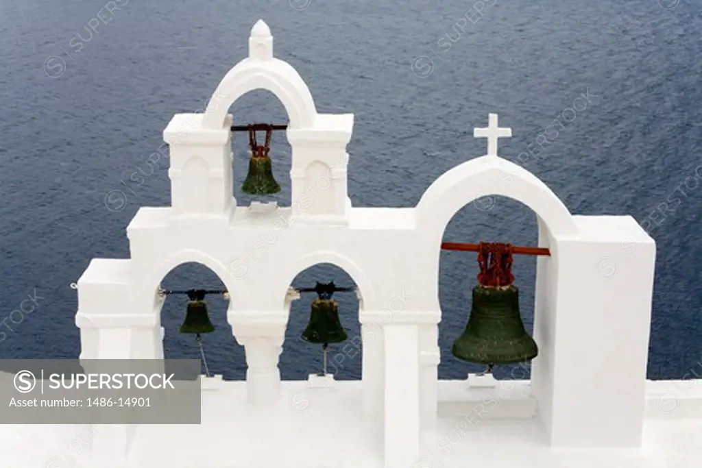 Belltower of Greek Orthodox Church in Oia village, Santorini Island, Greece, Europe