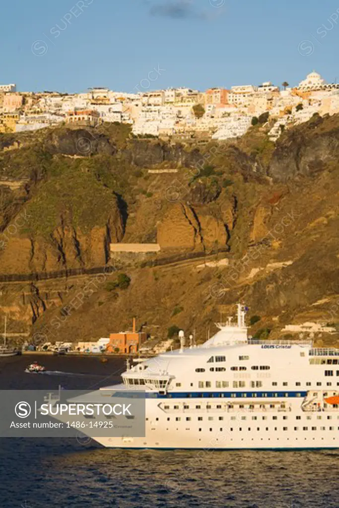 Cruise ship near Fira town, Santorini Island, Cyclades, Greece, Europe