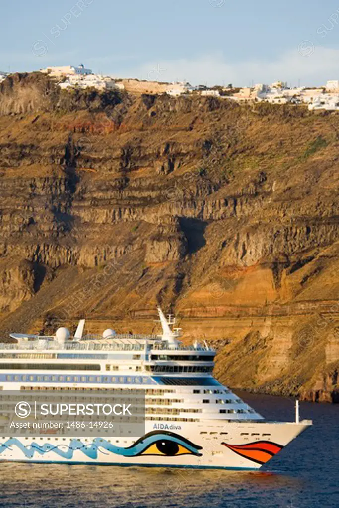 Cruise ship near Fira town, Santorini Island, Cyclades, Greece, Europe
