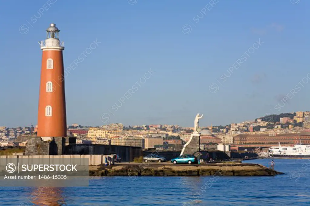 Breakwater lighthouse in Naples Port, Campania, Italy, Europe