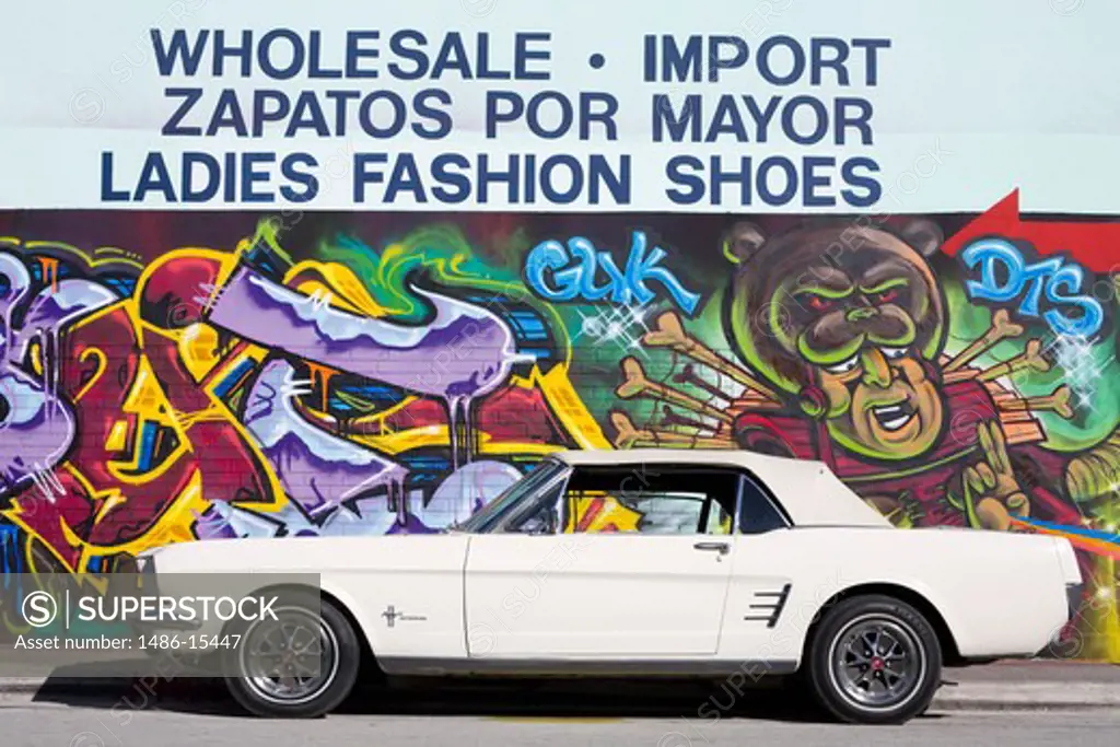 Ford Mustang & mural in the Wynwood Arts District, Miami, Florida, USA