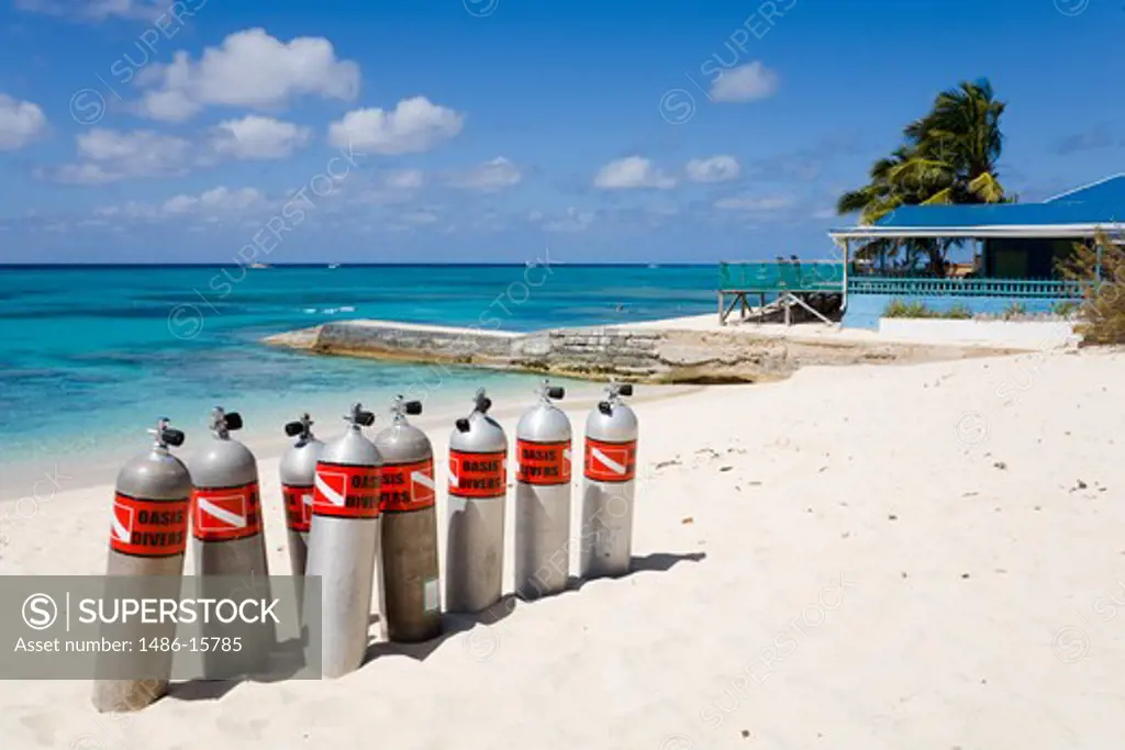 Caribbean, Turks and Caicos Islands, Grand Turk Island, Cockburn Town, Cedar Grove Beach, Oxygen tanks on beach