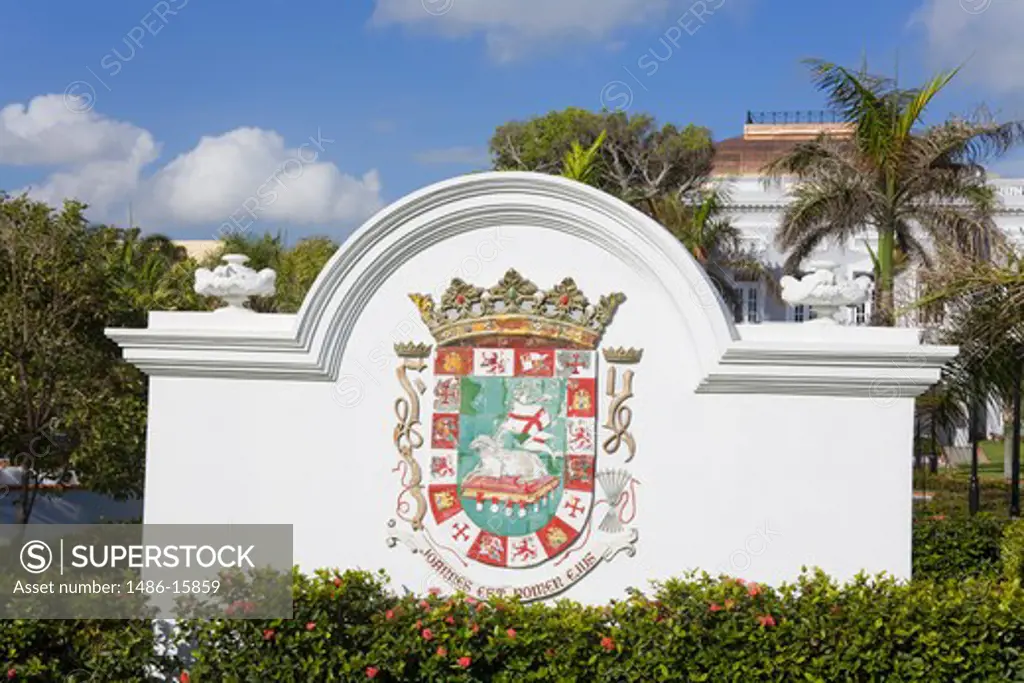 Puerto Rican coat of arms on a wall at the old casino, Old San Juan, San Juan, Puerto Rico