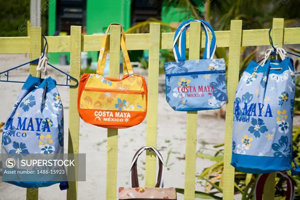 Mexico, Quintana Roo, Costa Maya,  Mahahaul Beach Boardwalk,  Souvenirs on fence